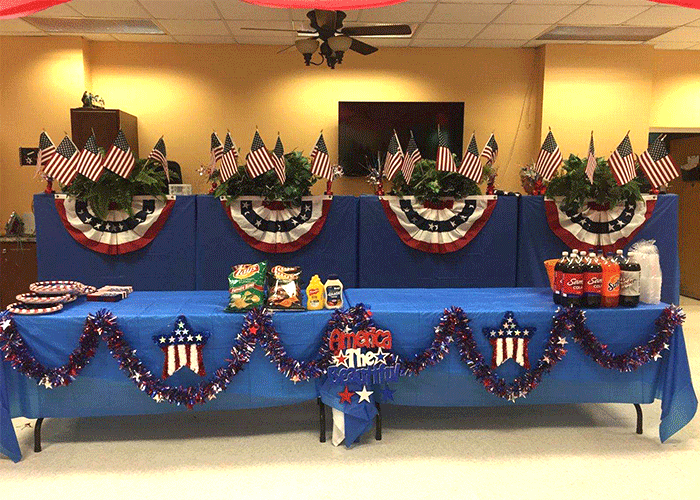 4th of July decorations set up on long table
